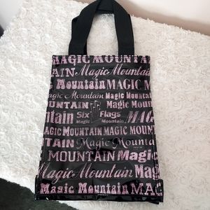 New Magic mountain black and sparkly purple small tote bag